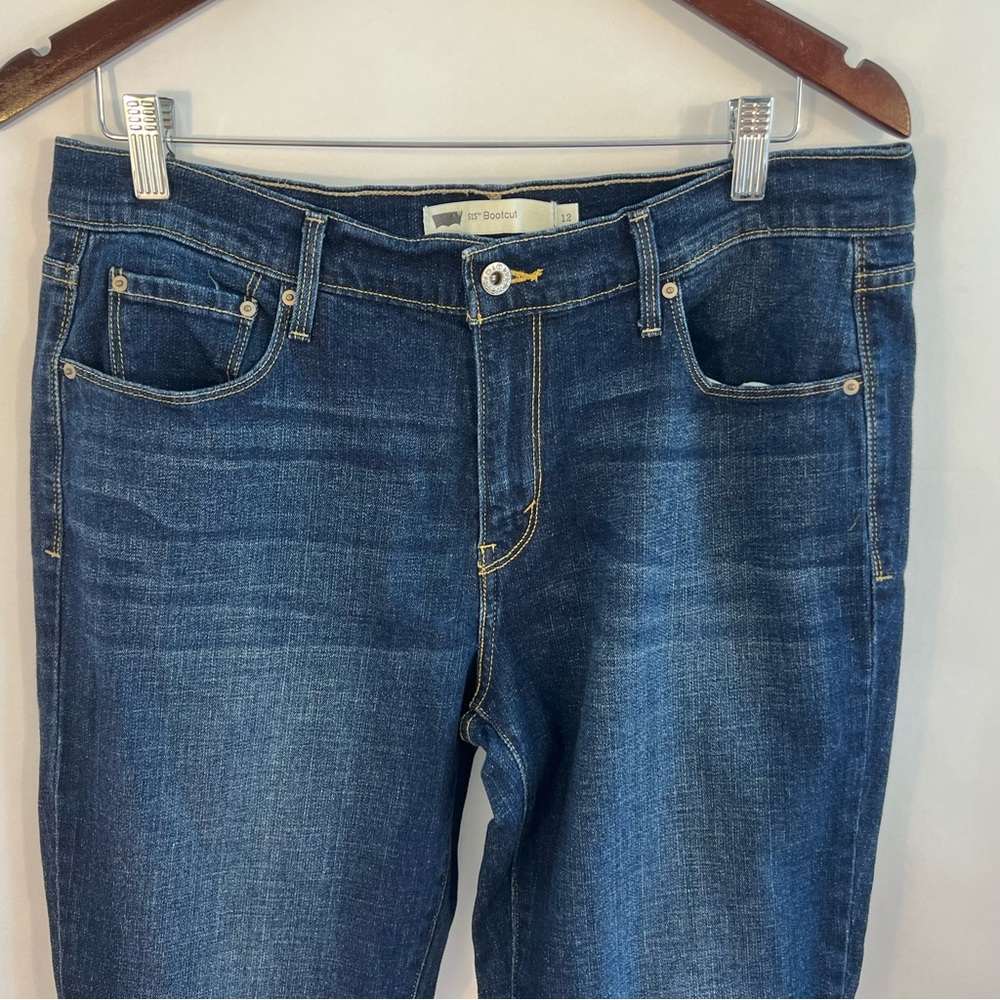 Levis 515 Bootcut Jeans Medium Wash Blue Flared Mid Rise Womens 32 Embroidered - Picture 2 of 4